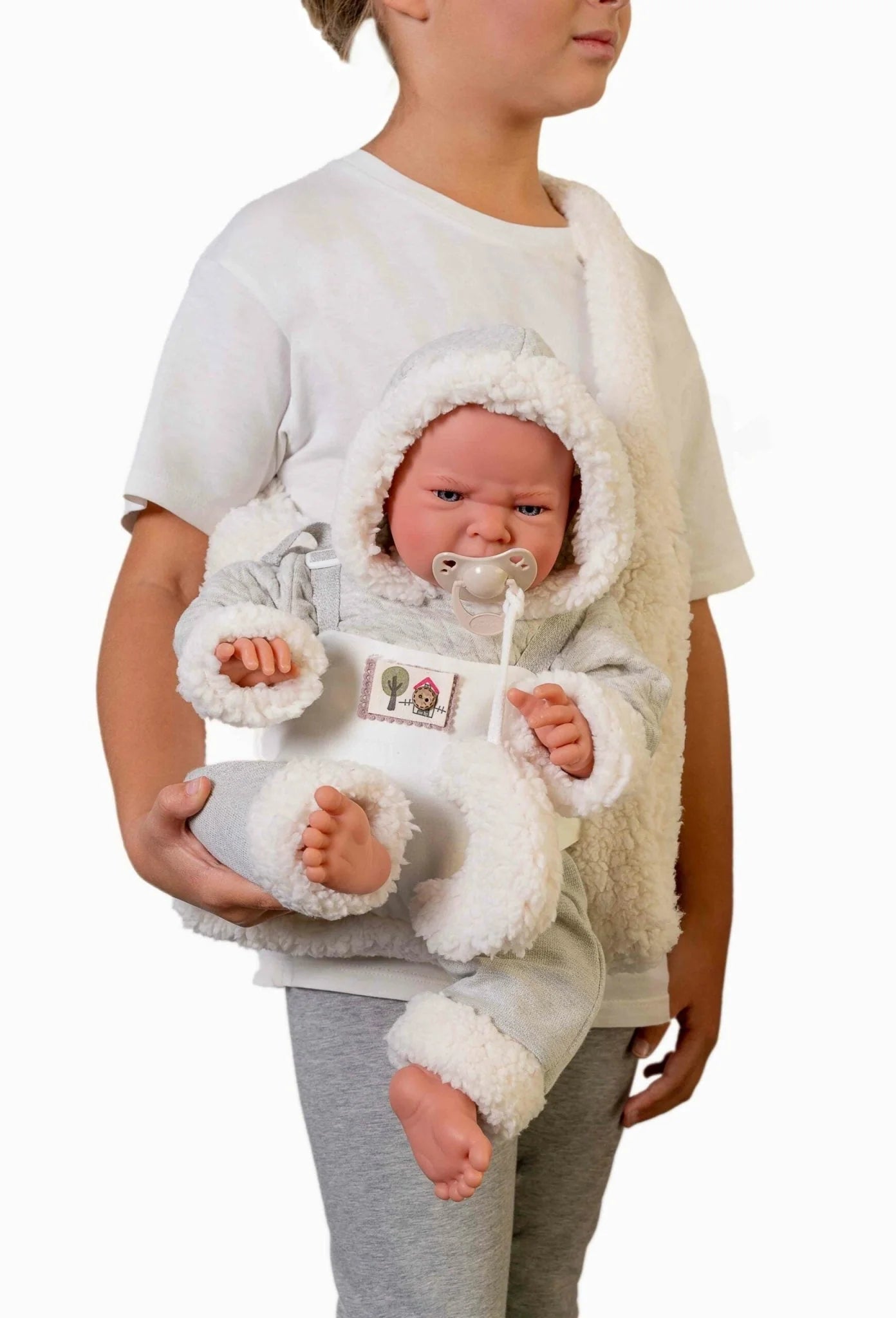 Antonio Juan doll - Newborn baby Lea with sheepskin baby carrier bag